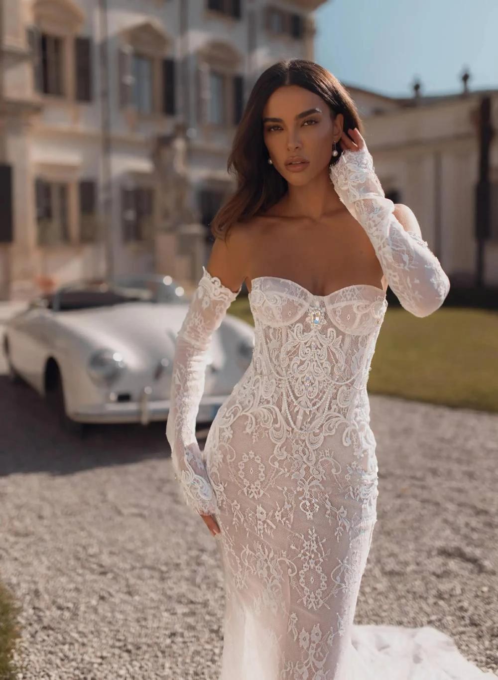 Model wearing a white dress by Berta Privee