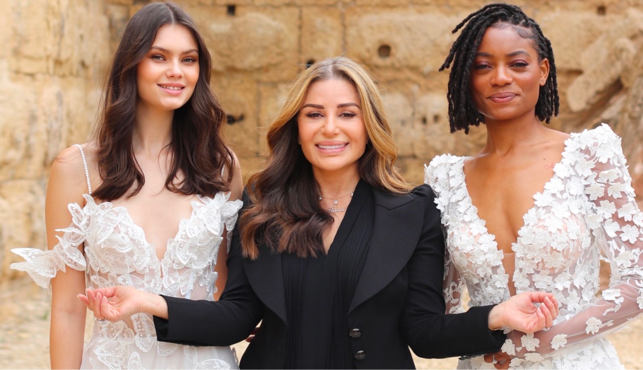 Models wearing a white dress