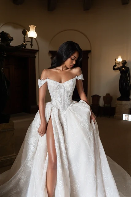 Model wearing a white dress by Verdin NY