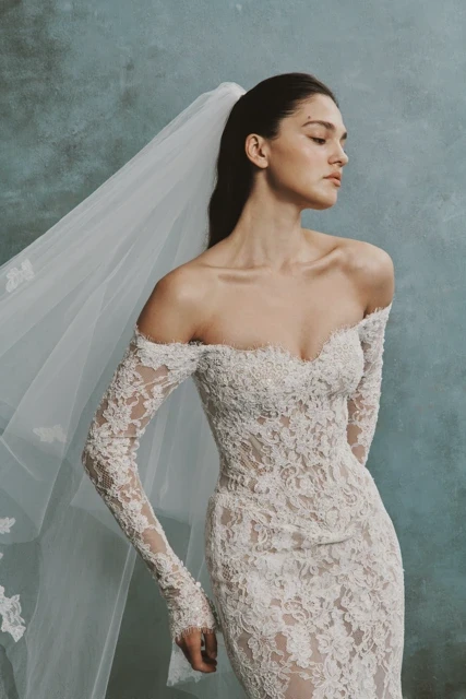 Model wearing a white dress